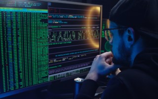 Free A Man Looking at a Computer Screen with Data Stock Photo