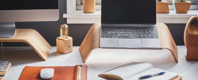Free A stylish and contemporary home office setup with laptop and desk accessories. Stock Photo